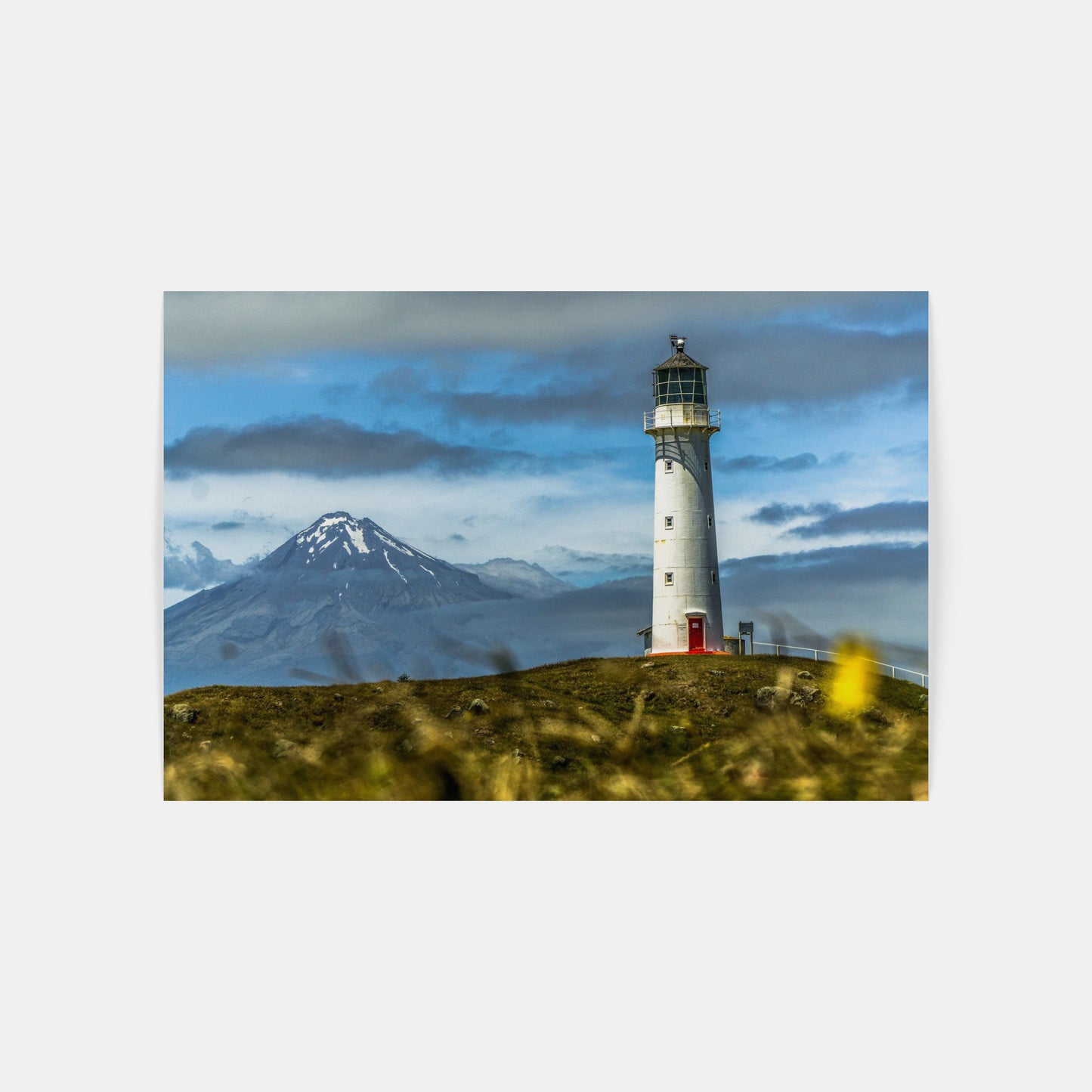 Cape Egmont Lighthouse with Taranaki Volcano, New Zealand